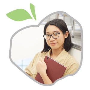 teen holding a notebook